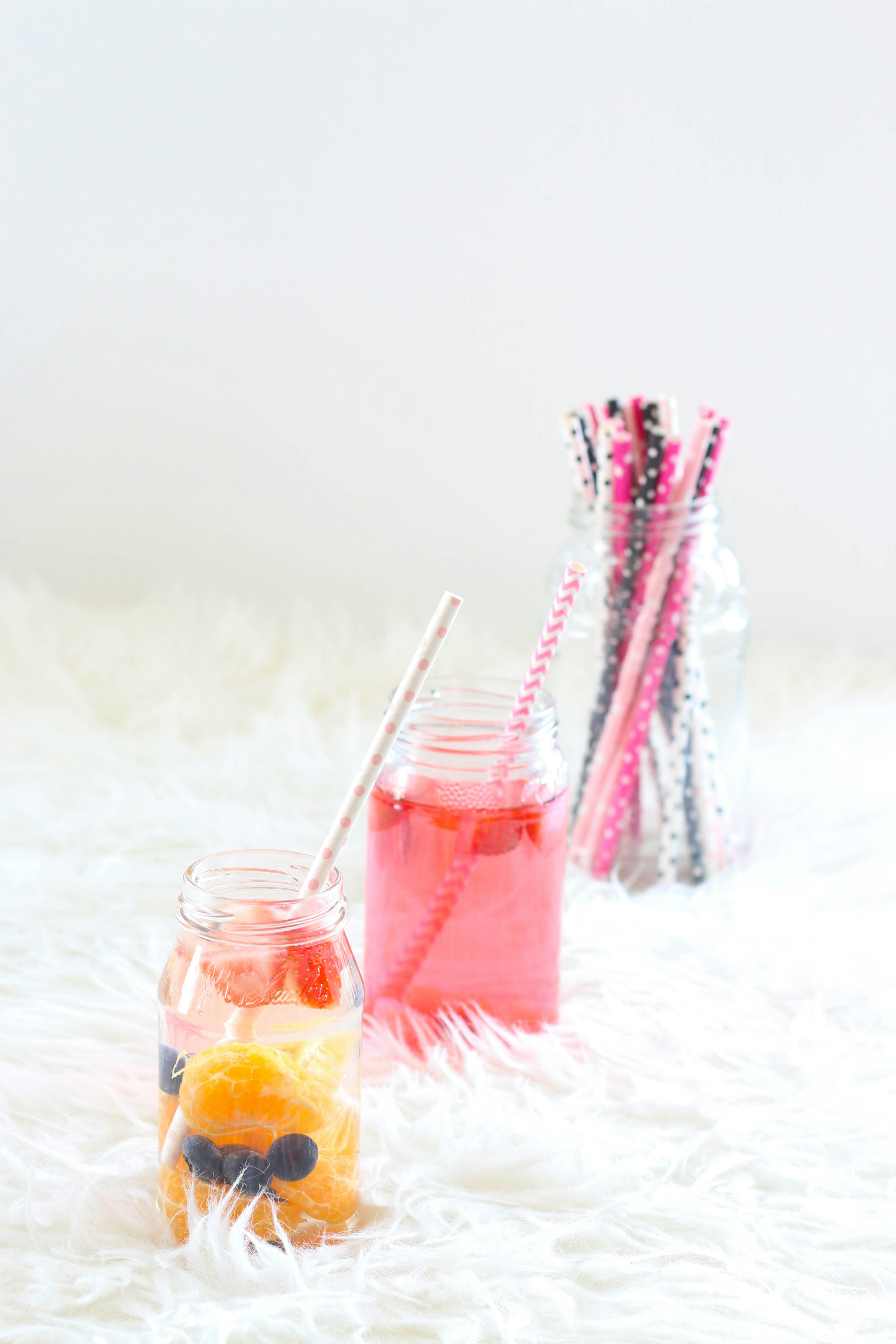 clear drinking glass with orange juice